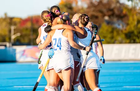 Field hockey team huddle