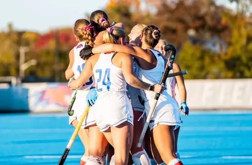 Field hockey team huddle
