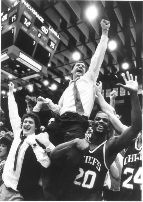 Head Coach Don Doucette celebrating 1988 national championship on the shoulders of players