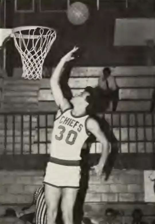 Bill Herenda jumping for a layup