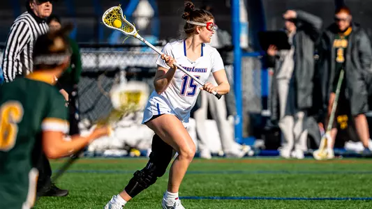 Elsa Skinner with the ball vs. Siena