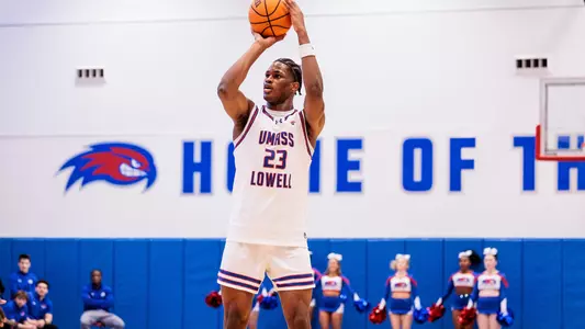 Victor Okojie shooting a basketball