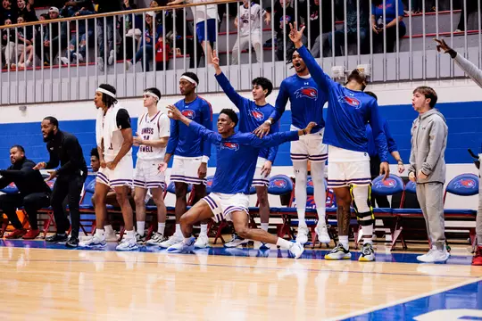 River Hawks cheering on bench