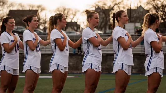 WLAX Lines Up for National Anthem ahead of Dartmouth Game
