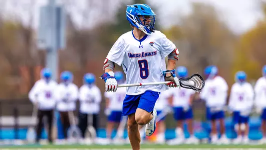 Men's Lacrosse's James Donnelly Running with Ball in Stick Against Vermont