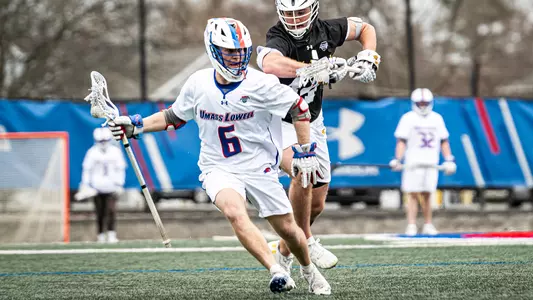 Griffin Sumwalt with the ball in stick vs. UMBC