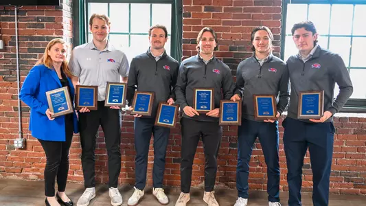 Group photo of all the award winners from the 2026 Hockey Awards Banquet