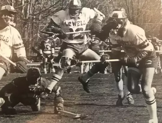 lacrosse player jumping
