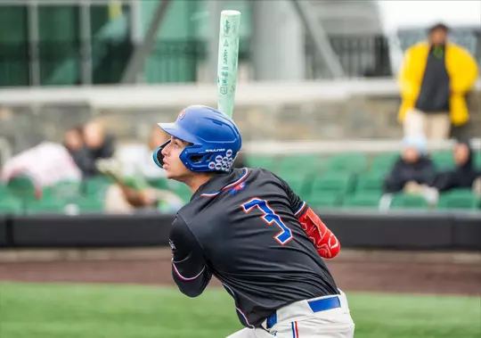 UML Baseball 2026 - Carlos Martinez swinging at the pitch as it flies down the strike zone