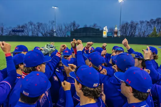 UMass Lowell Baseball team huddle on LeLacheur Park postgame