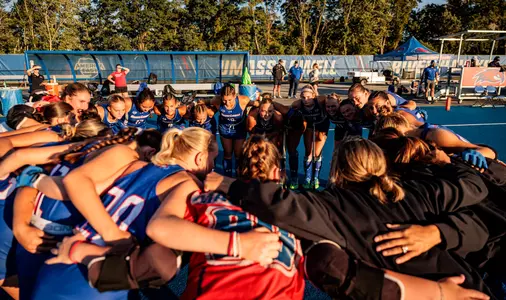 Field Hockey team huddle pregame