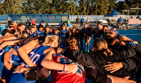 Field Hockey team huddle pregame