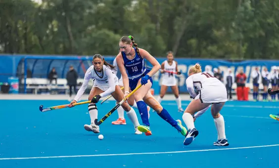 Alice Van Hemelen dribbling past Brown defense