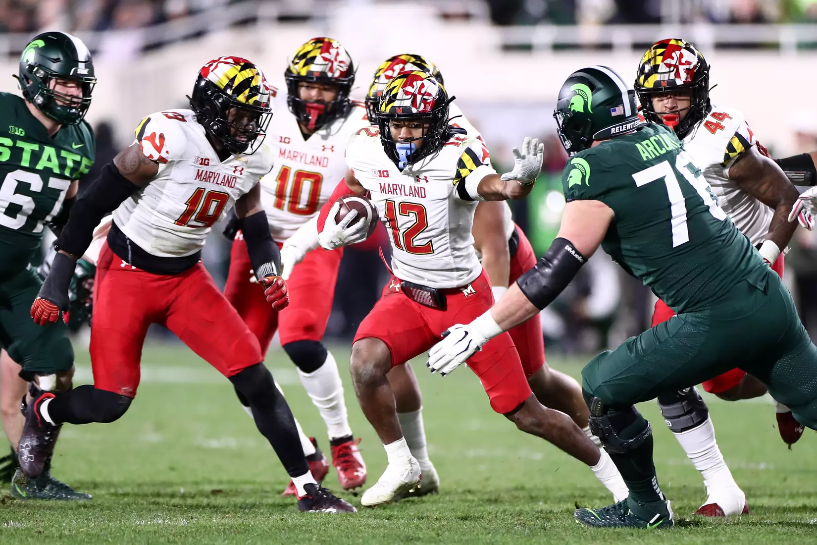 Defensive back Tarheeb Still (12) runs after recovering a fumble.
Maryland Terrapins vs. #8 Michigan State Spartans at Spartan Stadium in East Lansing, MI on Saturday, Nov. 13, 2021.
Maddie Kyler/Maryland Terrapins