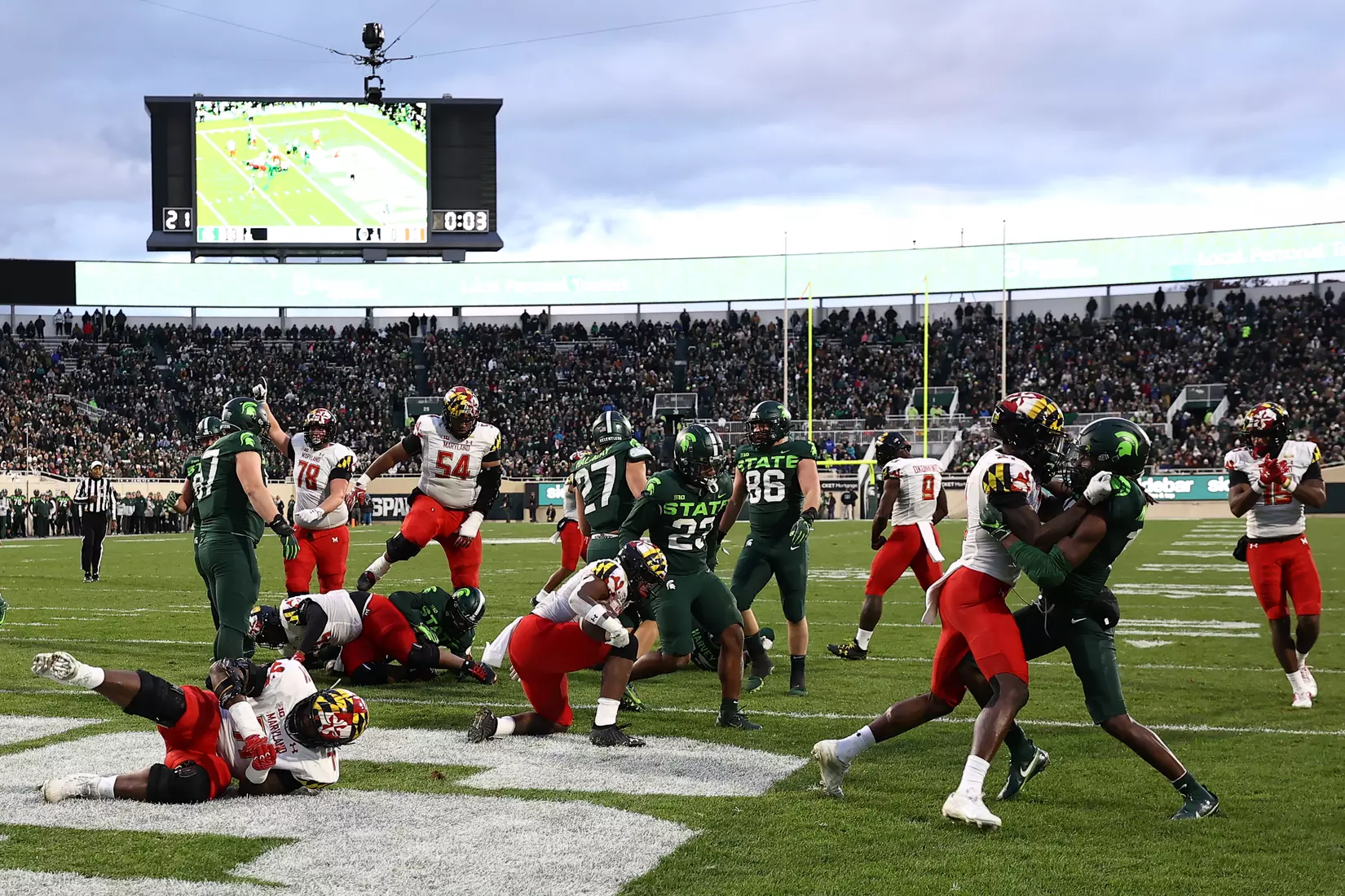 Running back Peny Boone (13) runs for a touchdown.
Maryland Terrapins vs. #8 Michigan State Spartans at Spartan Stadium in East Lansing, MI on Saturday, Nov. 13, 2021.
Maddie Kyler/Maryland Terrapins