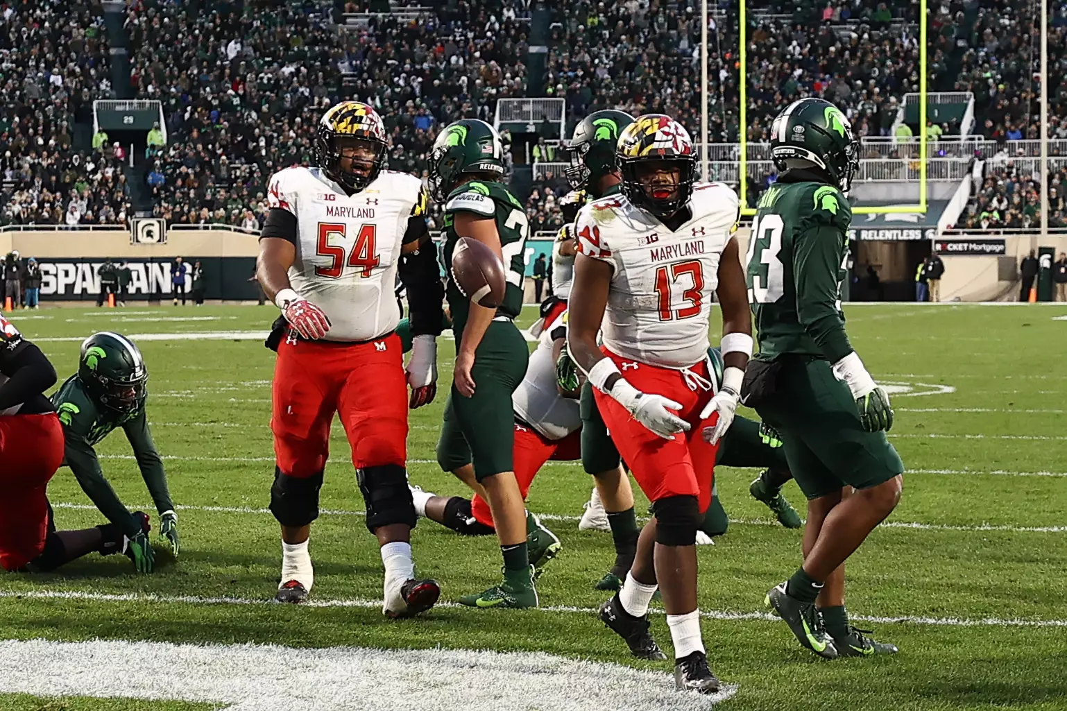 Running back Peny Boone (13) celebrates a touchdown.
Maryland Terrapins vs. #8 Michigan State Spartans at Spartan Stadium in East Lansing, MI on Saturday, Nov. 13, 2021.
Maddie Kyler/Maryland Terrapins