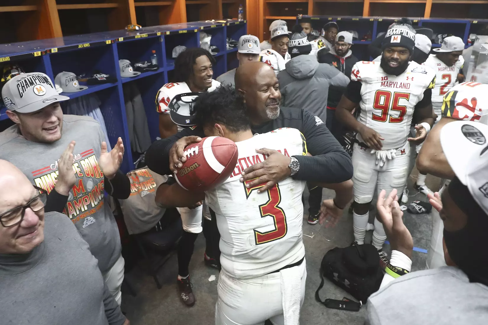 Head Coach Michael Locksley and quarterback Taulia Tagovailoa (3).
