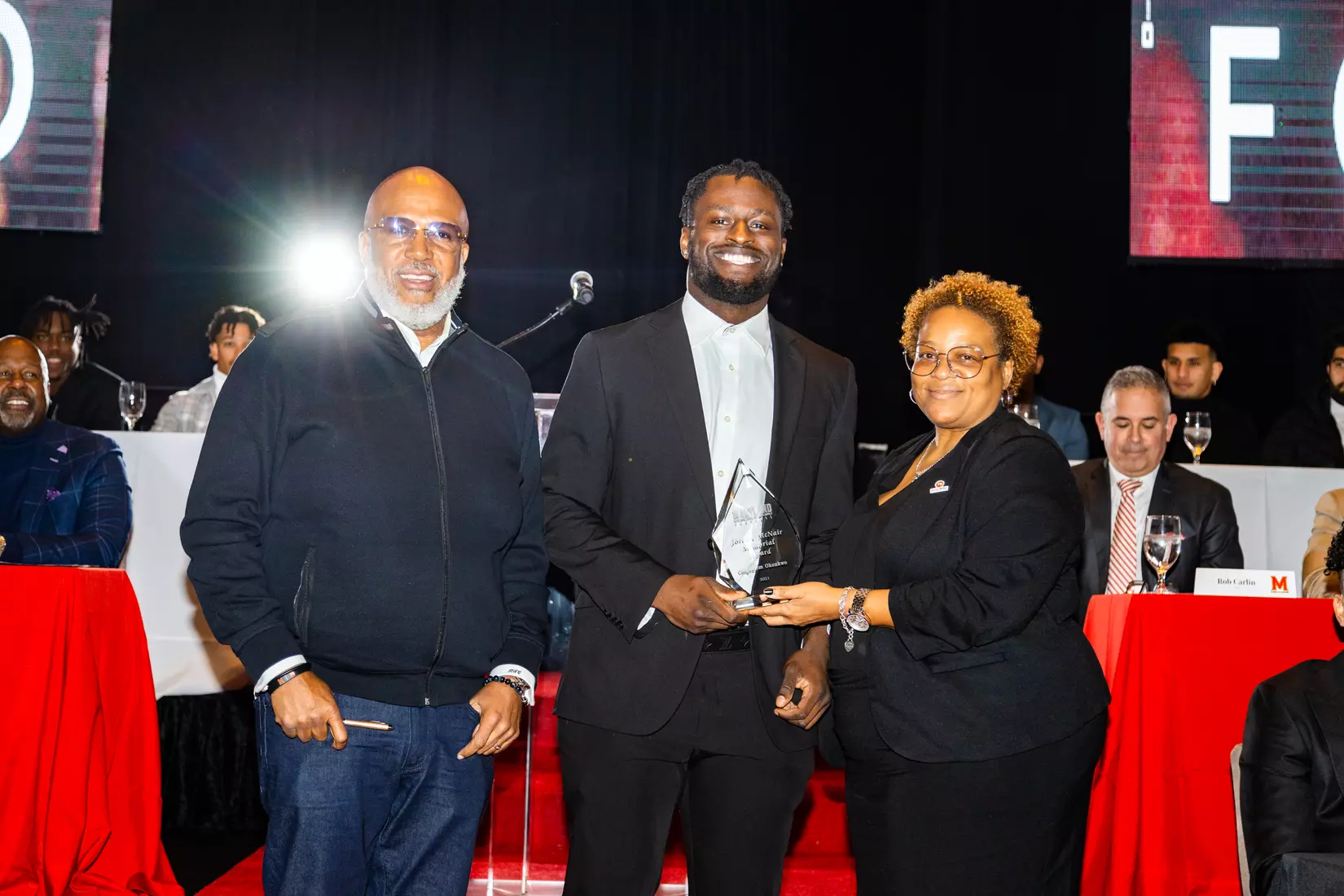 Chigoziem Okonkwo with Marty McNair and Tonya Wilson