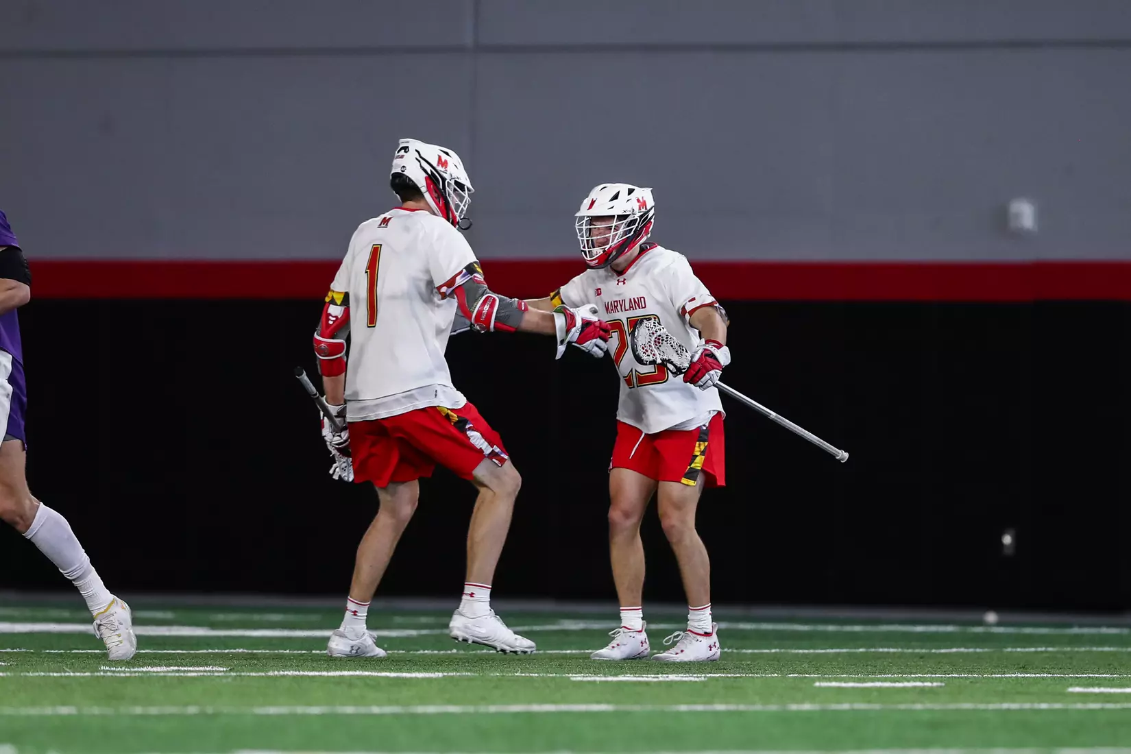 Kyle Long (23) and Logan Wisnauskas (1). Maryland Terrapins vs. the Albany Great Danes at Jones-Hill House in College Park, MD on Saturday March 12, 2022. Taylor McLaughlin/Maryland Terrapins