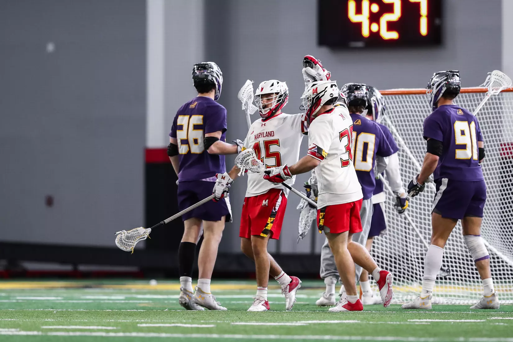 Daniel Kelly (45) and Ajax Zappitello (36). Maryland Terrapins vs. the Albany Great Danes at Jones-Hill House in College Park, MD on Saturday March 12, 2022. Taylor McLaughlin/Maryland Terrapins