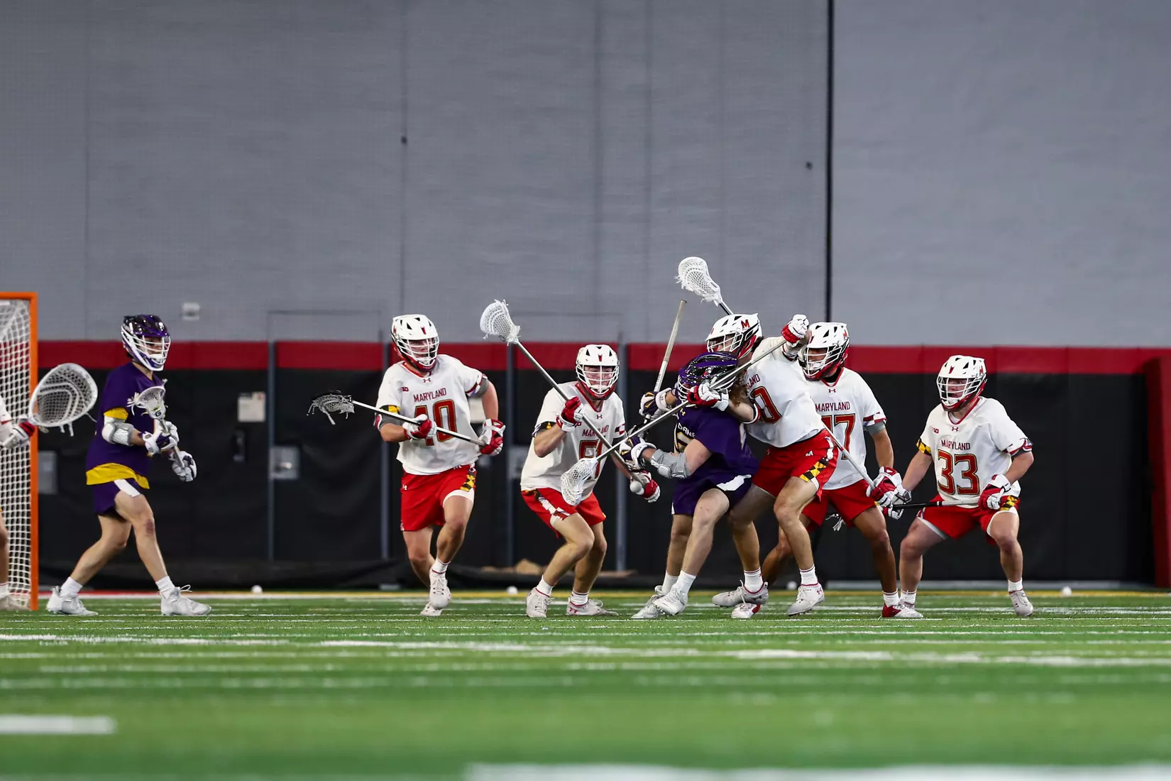 Colin Burlace (40), Matthew Kopp (10), Jack McDonald and Alex Wicks (33). Maryland Terrapins vs. the Albany Great Danes at Jones-Hill House in College Park, MD on Saturday March 12, 2022. Taylor McLaughlin/Maryland Terrapins