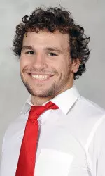 Black Tops Red, 17-12, in Wrestle-Offs