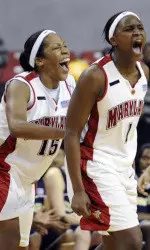 Langhorne Scores 2,000th Point in Rout of Miami