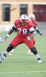 Lewis Dismissed from Football Team