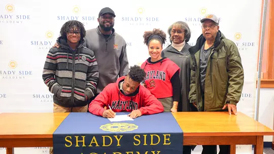 Dino Tomlin signing his NLI