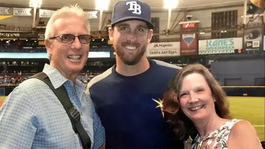 Adam Kolarek with his parents