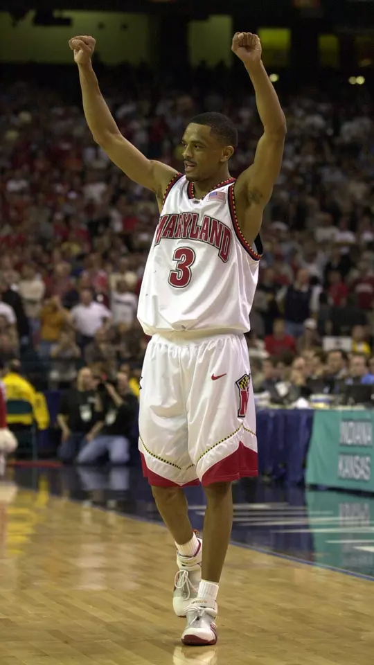 Juan Dixon celebrates in the NCAA title game