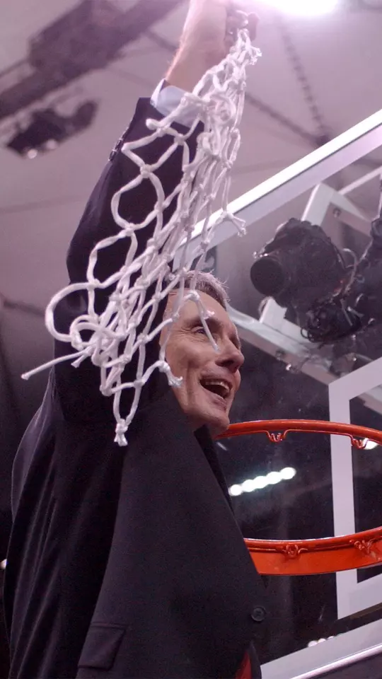 Gary Williams is all smiles cutting down the net after winning the 2002 NCAA title game