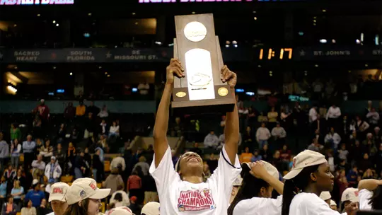 2006 NCAA Final Four Most Outstanding Player Laura Harper celebrated with the NCAA championship trophy