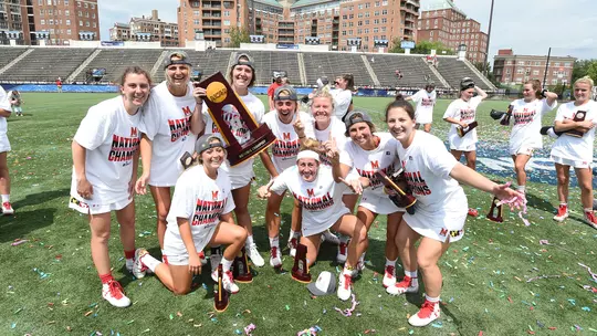 Nikki Sliwak celebrates an NCAA title with her teammates