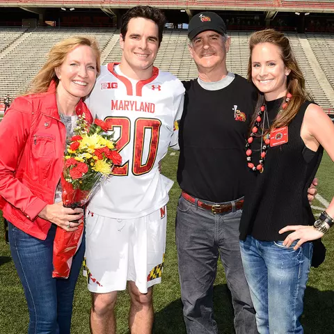 Nick Manis with his family on Senior Day in 2016