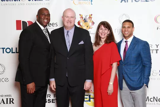 Jordan Steffy with Magic Johnson and others