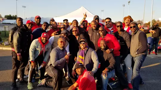 Jaime Wu with teammates at tailgate