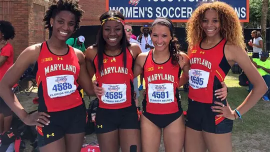 Noelle Anyangwe with the Shuttle Hurdle Relay Record Team