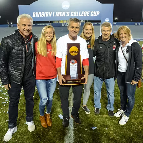 Sasho Cirovski with family and 2018 NCAA Trophy