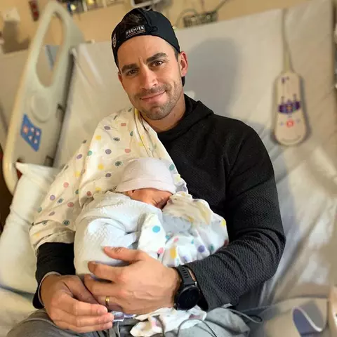 Brett Schmidt with baby Henry