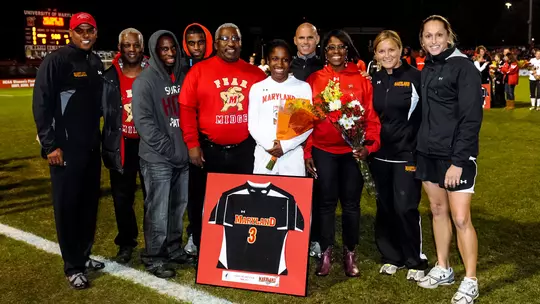 Jasmyne Spencer with her family on Senior Day