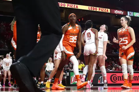 Angel Reese (10), Faith Masonius (13)NCAA WBB: #8 Maryland Terrapins vs. Miami Hurricanes at XFINITY Center in College Park, MD on Thursday, Dec. 2, 2021. Zach Bland/Maryland Terrapins