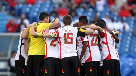 Patrick Mullins with teammates