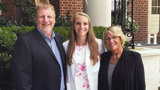 Kirsten Confroy and her parents