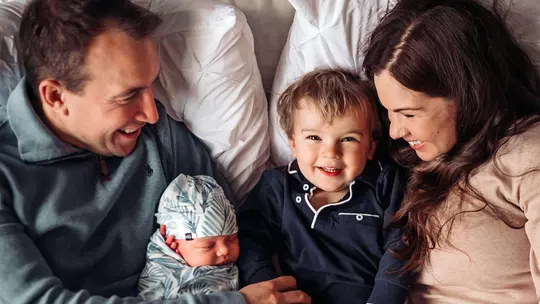 Jason and Caitlin Herrick with family