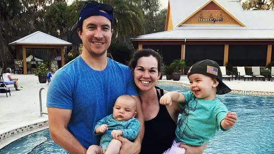 Jason and Caitlin Herrick with family