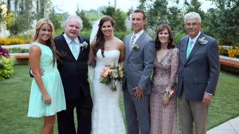 Jason and Caitlin Herrick with their parents