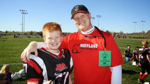 Tommy Varhall with his father