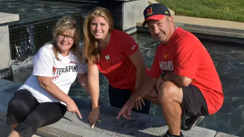 Sami Main with her parents