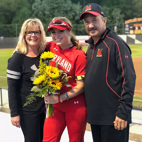 Sami Main with parents on Senior Day